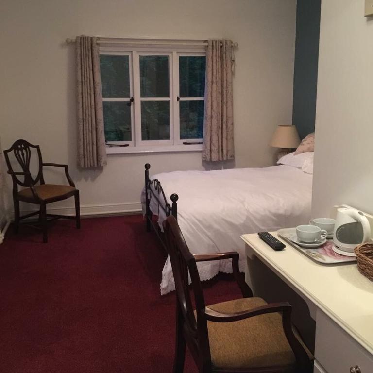 Cottage Inn Lynton Quarto foto